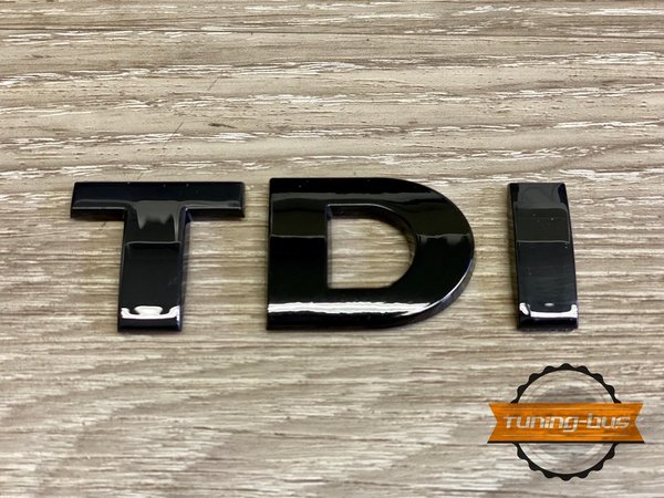 Schriftzug " TDI" schwarz glänzend